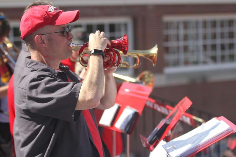 a man playing a trumpet