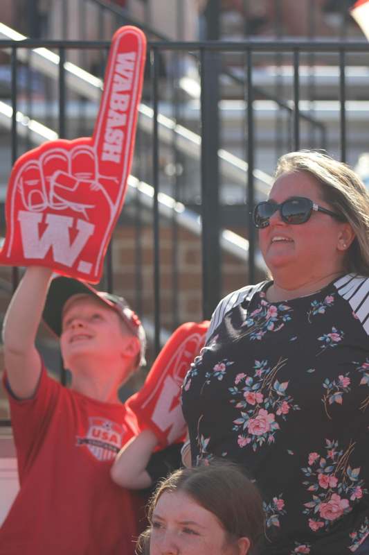 a woman and boy in red t-shirts