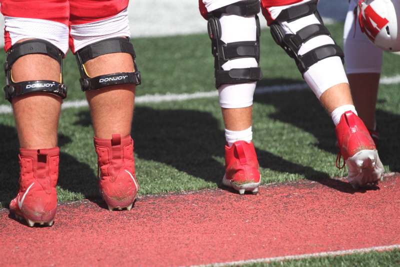 a close-up of a football player's legs