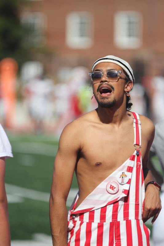 a man wearing sunglasses and a hat