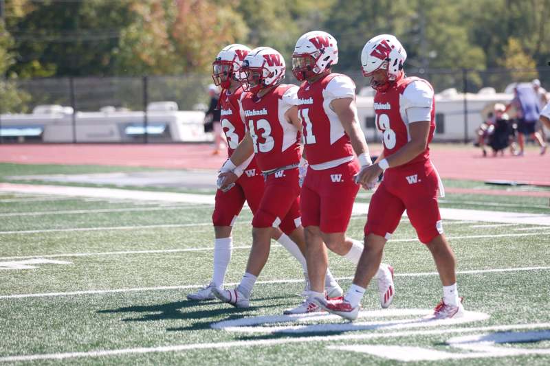 a group of football players on a field