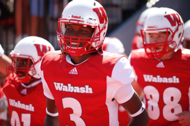 a group of football players wearing helmets