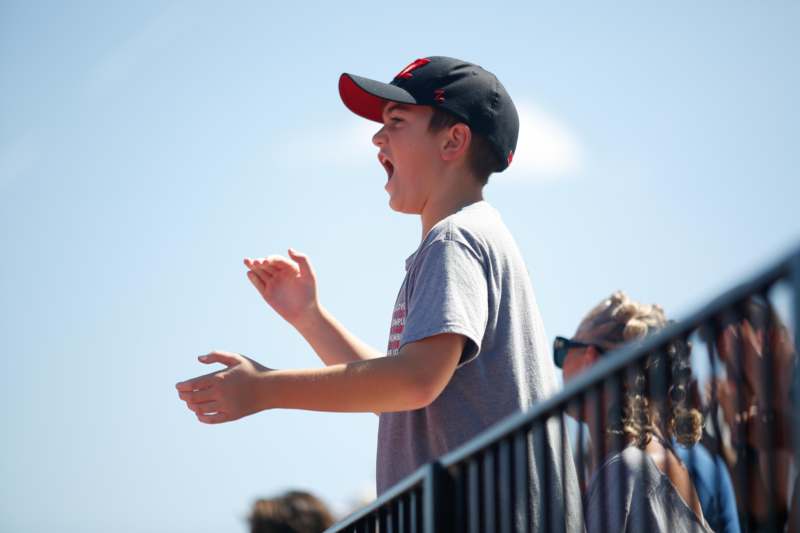 a boy with his mouth open