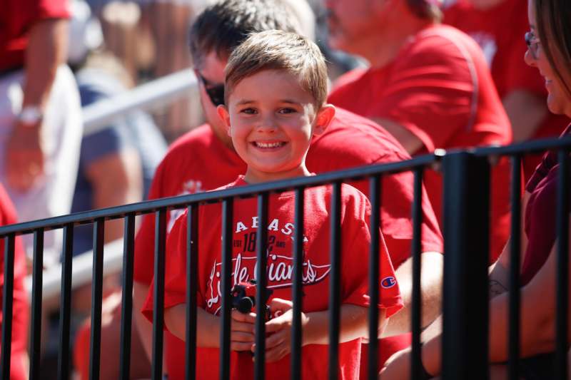 a boy smiling at camera