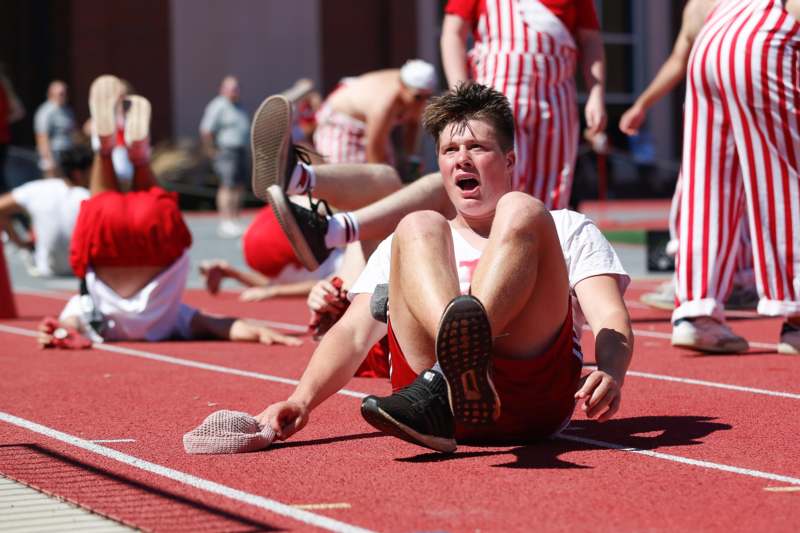 a man sitting on a track