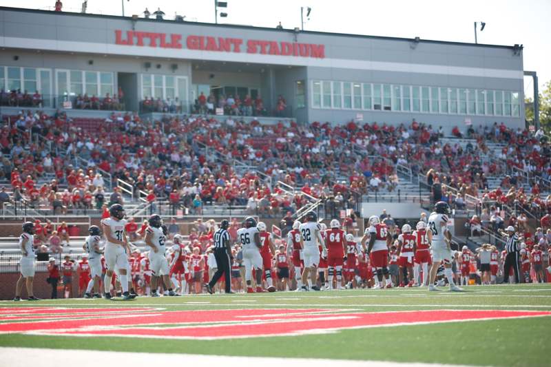 a group of football players on a field