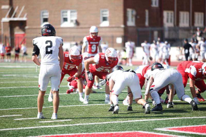 a group of football players on a field