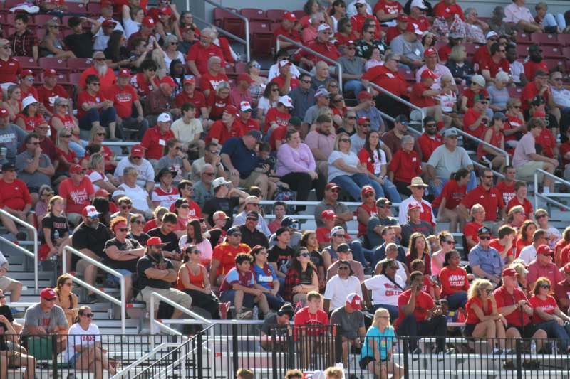 a crowd of people in bleachers