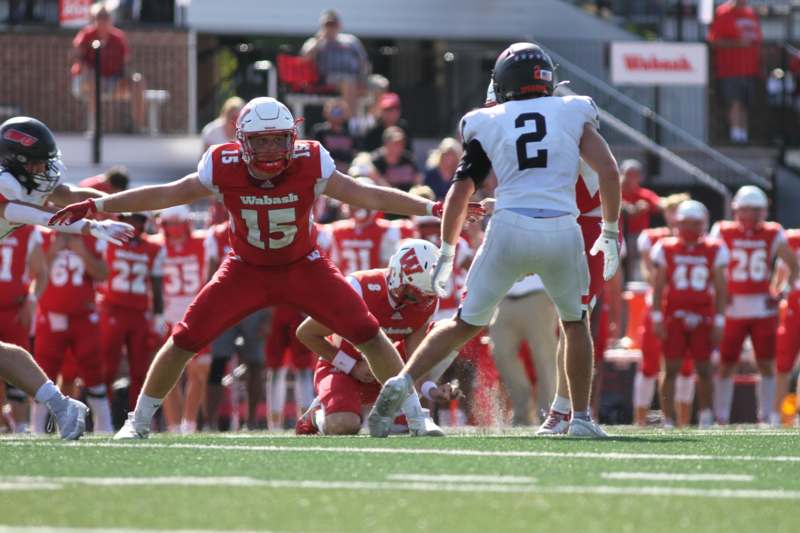 a football player in a red uniform