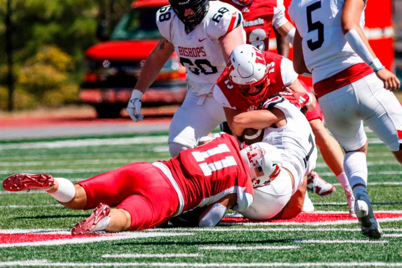 a football player falling into the ground