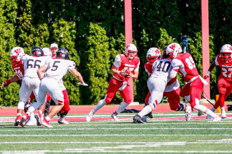 a football players running on a field