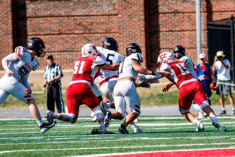 a group of football players on a field