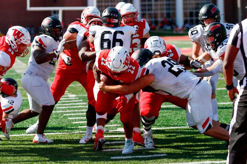 a group of football players on a field