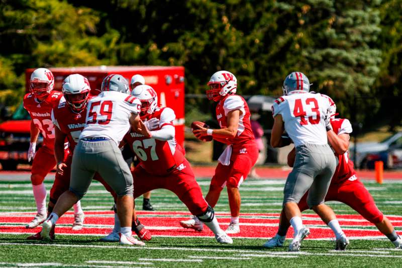 a group of football players on a field