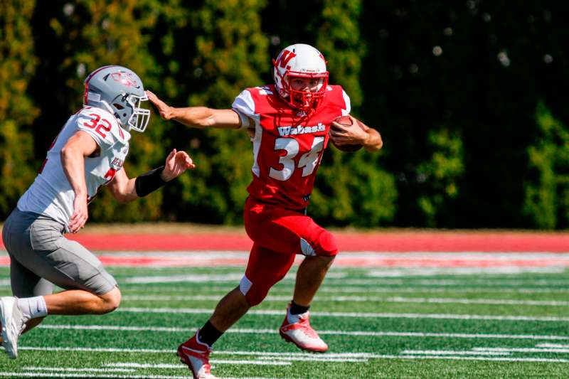 a football player running with the ball