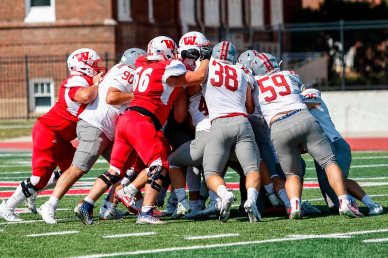 a group of football players on a field