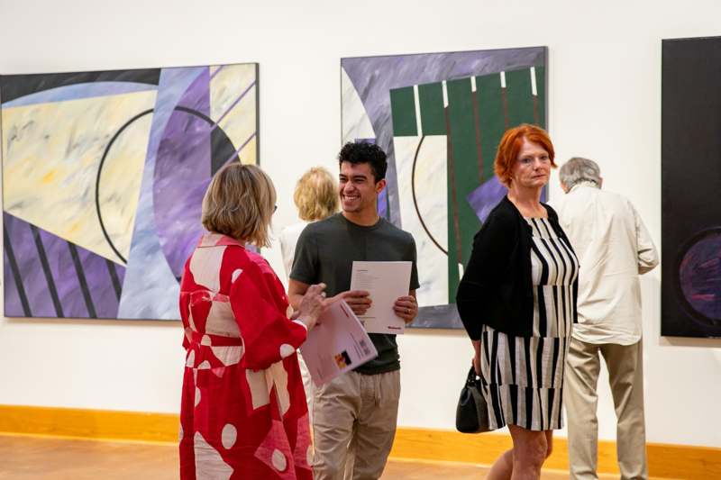 a group of people in a museum