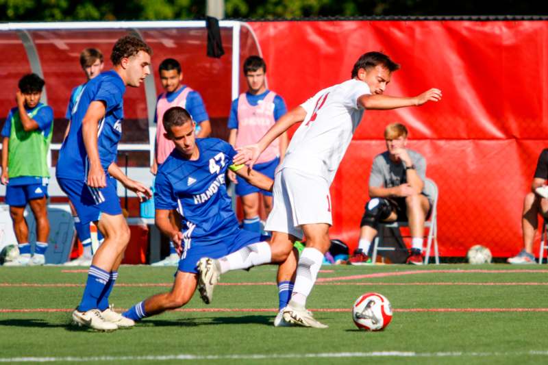 a group of men playing football