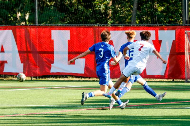 a group of people playing football