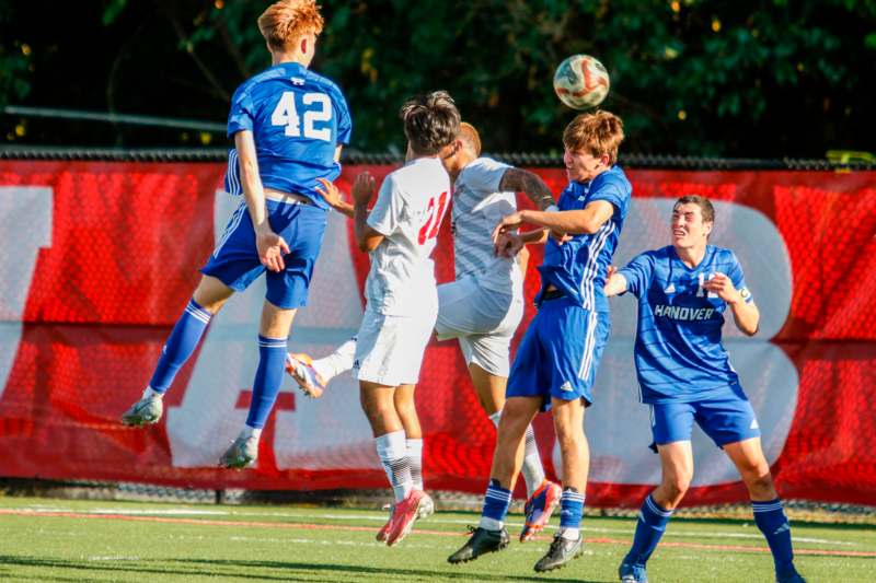 a group of men playing football