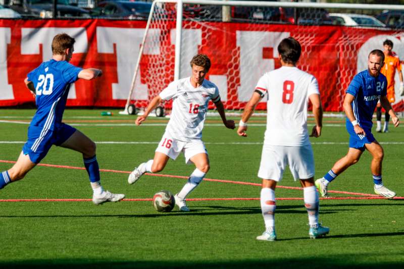 a group of men playing football