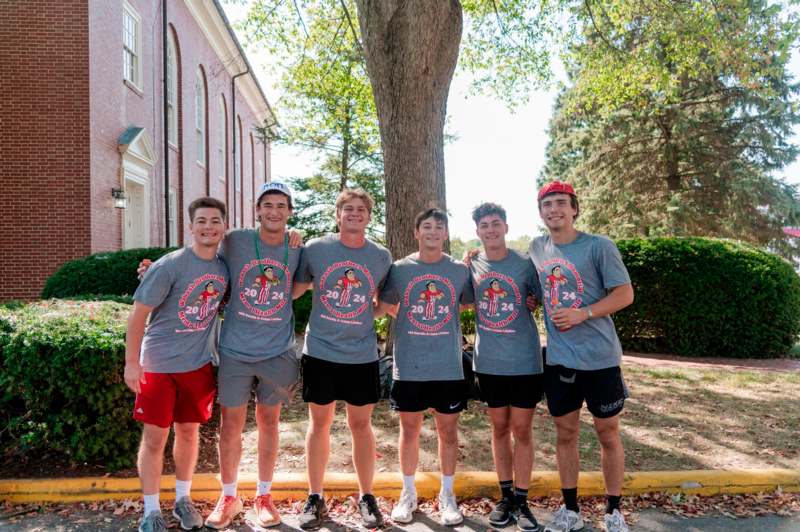 a group of boys in matching t-shirts