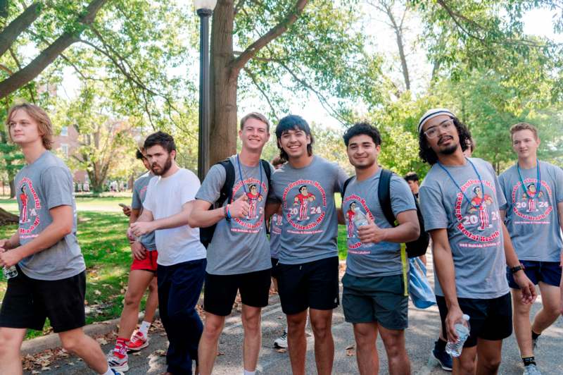 a group of men in matching t-shirts