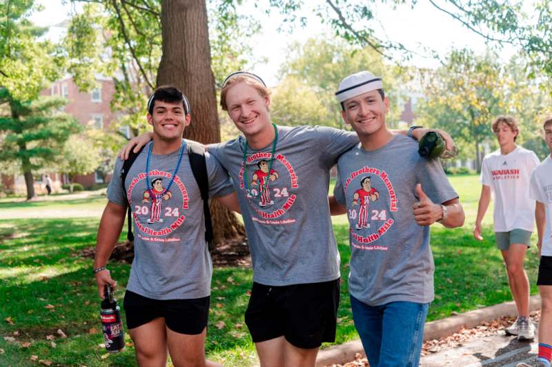 a group of men wearing matching shirts