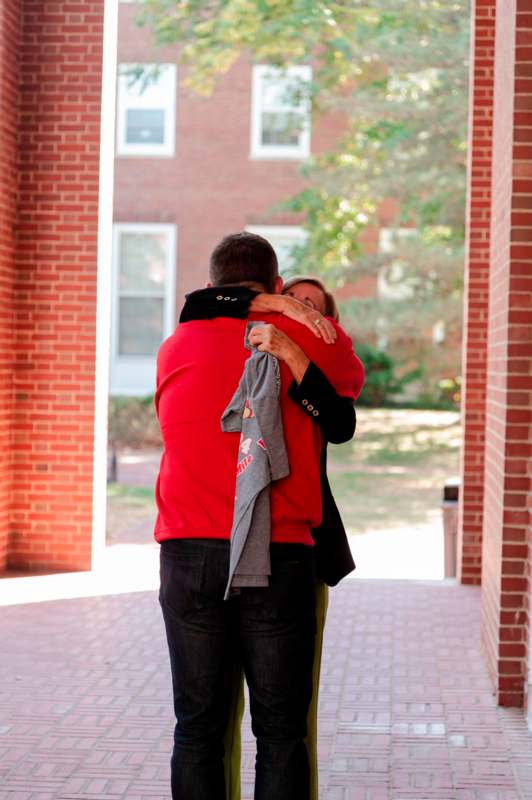 a man and woman hugging