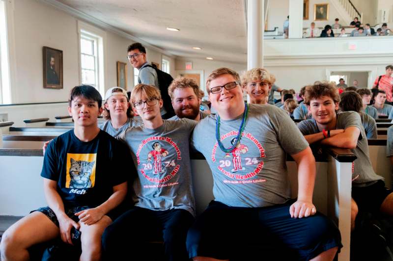 a group of people sitting in a room