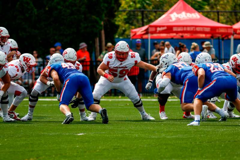 a group of football players on a field