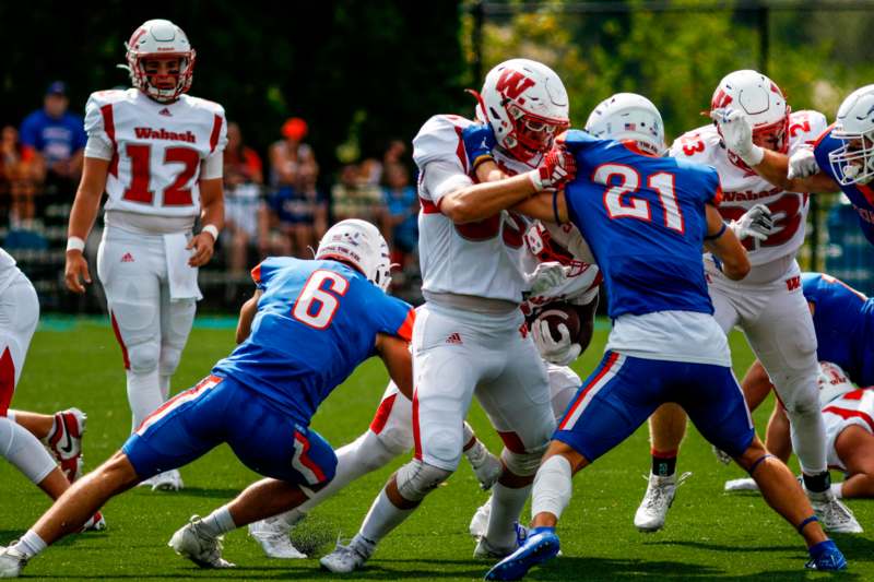 a group of football players in a game