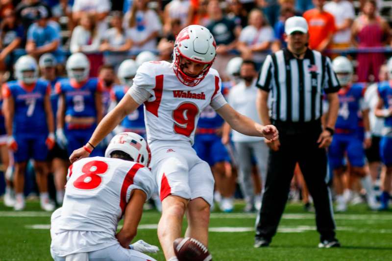 a football player falling down to the ground