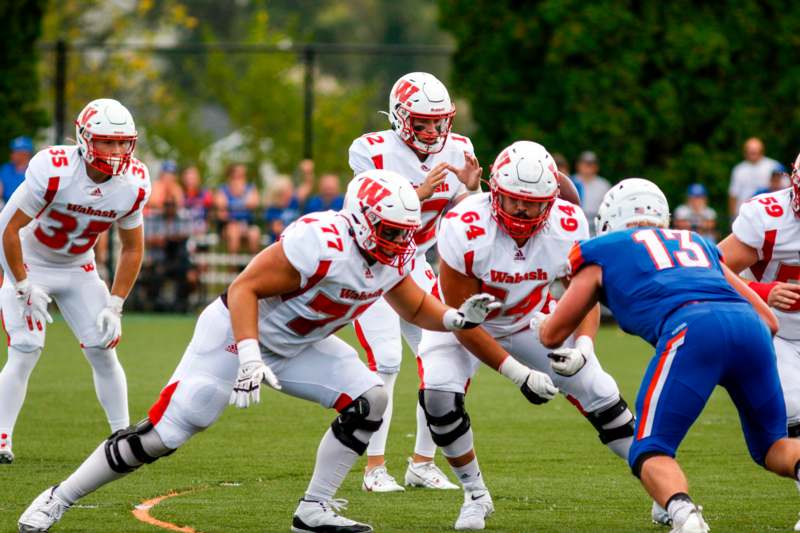 a group of football players on a field