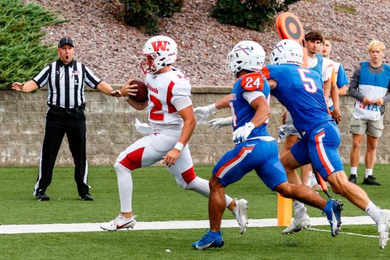 a group of people playing football