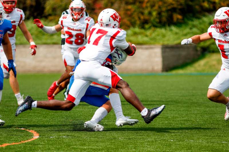 a group of people playing football