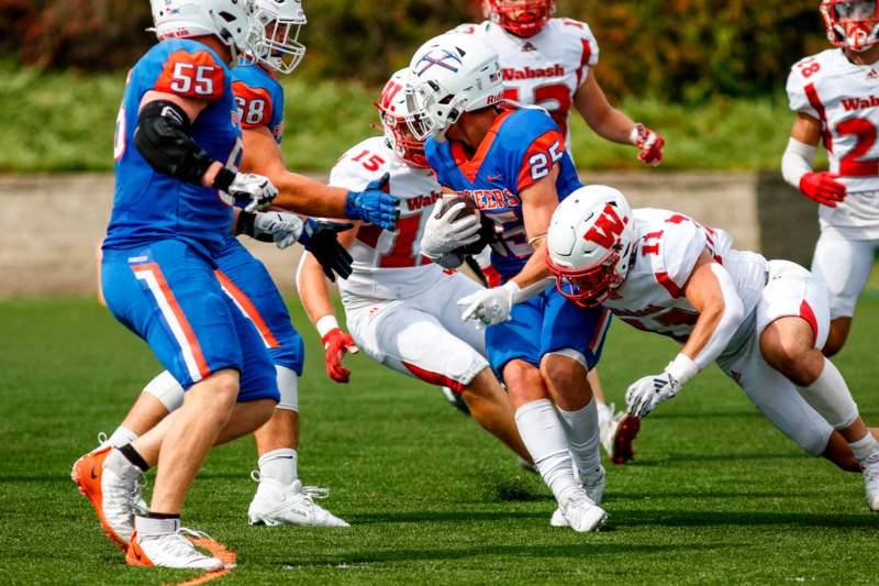 a group of football players on a field