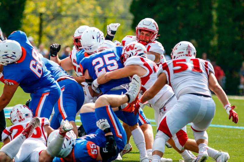 a group of football players on a field