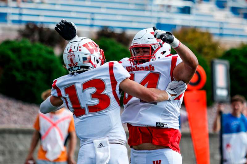 two football players hugging each other