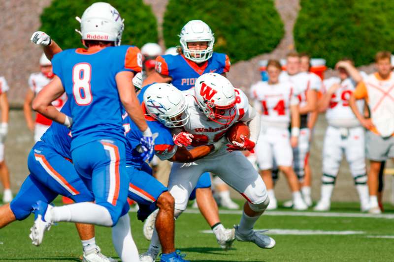 a group of football players on a field