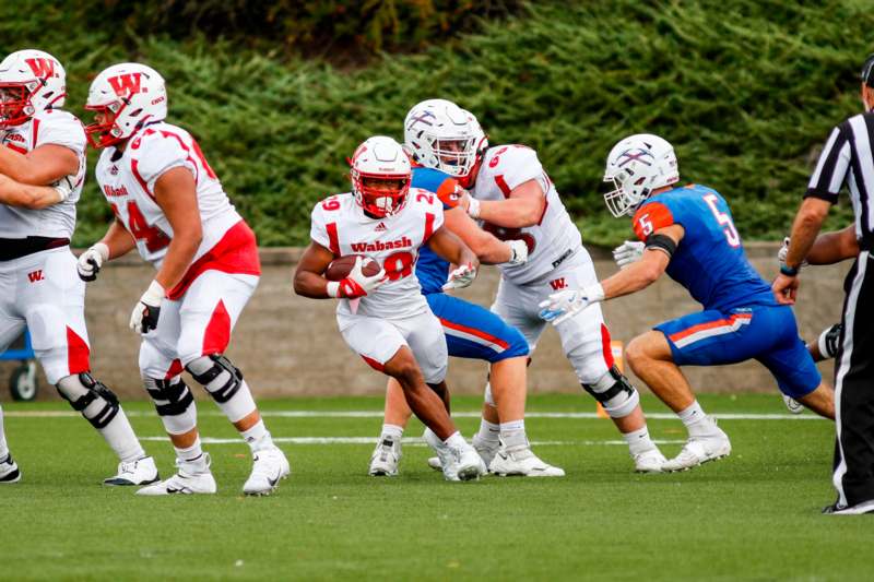 a group of football players on a field