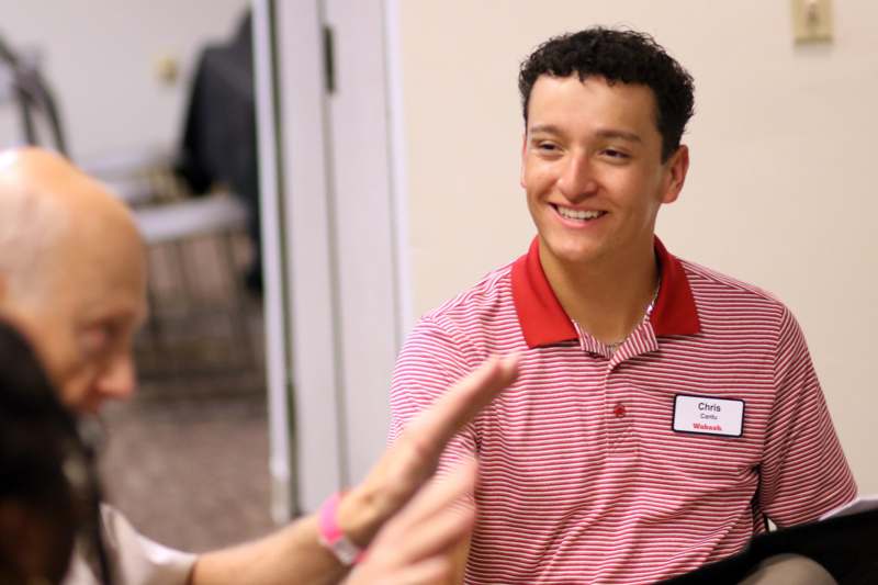 a man in a red striped shirt