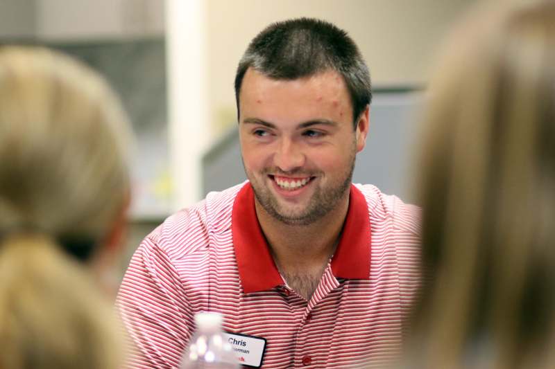 a man in a red and white striped shirt