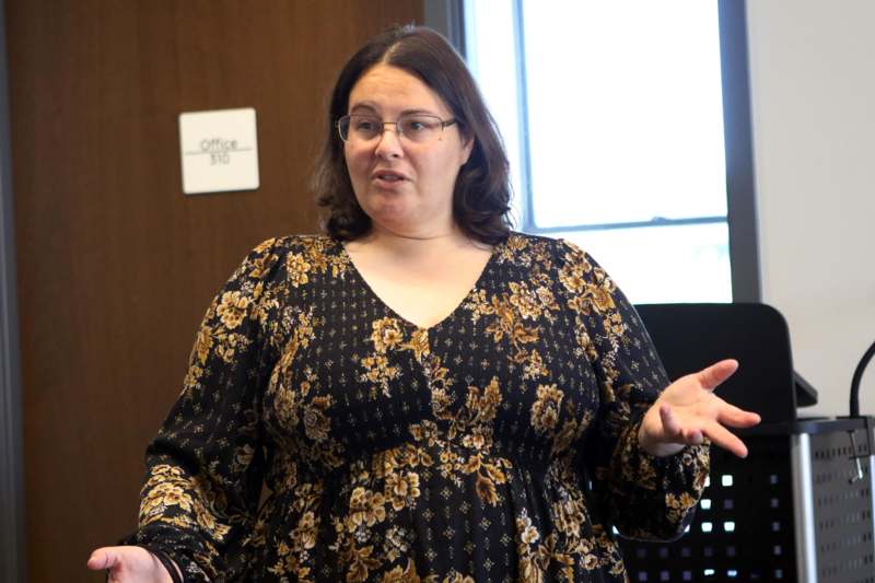 a woman in a floral dress