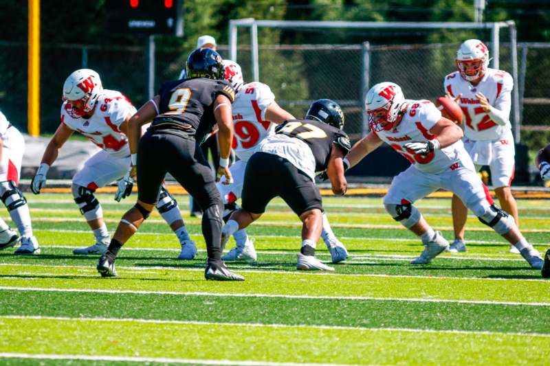 a group of football players on a field