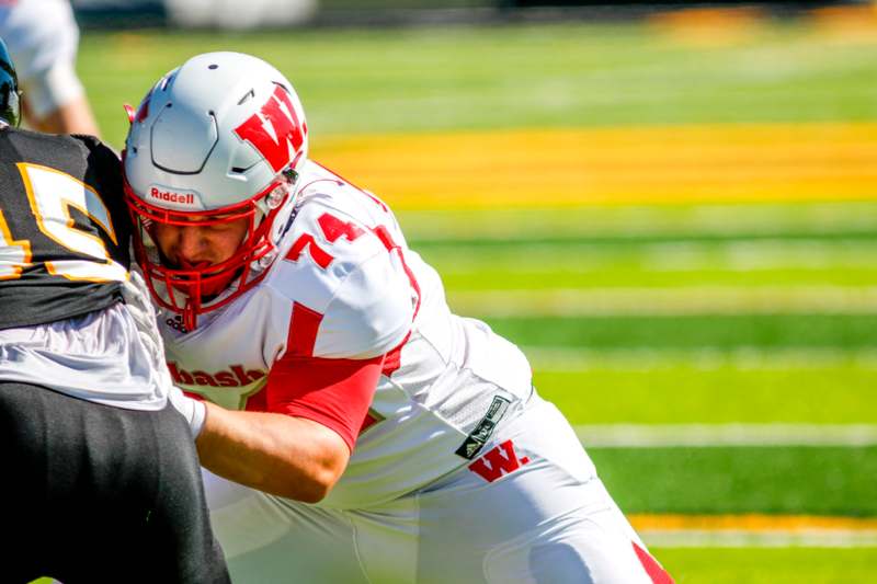 a football player in a helmet