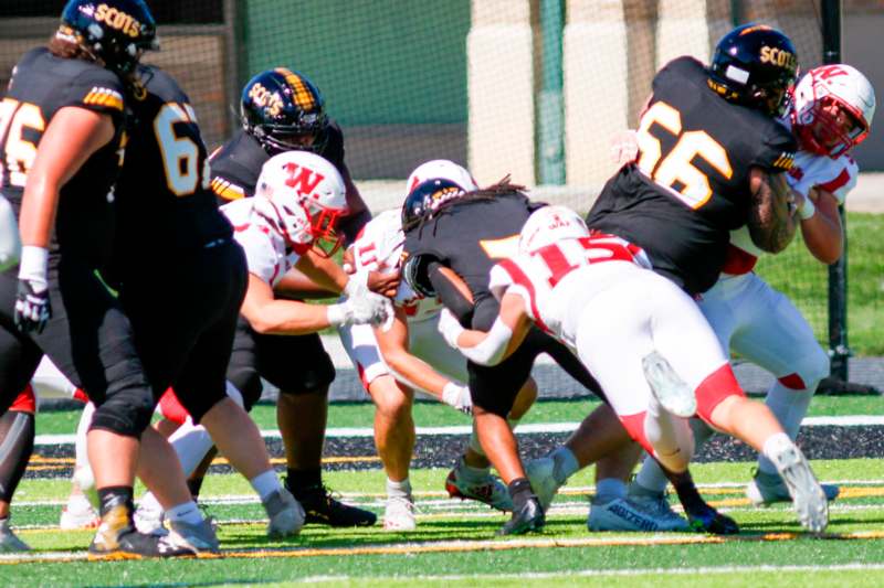 a group of football players on a field