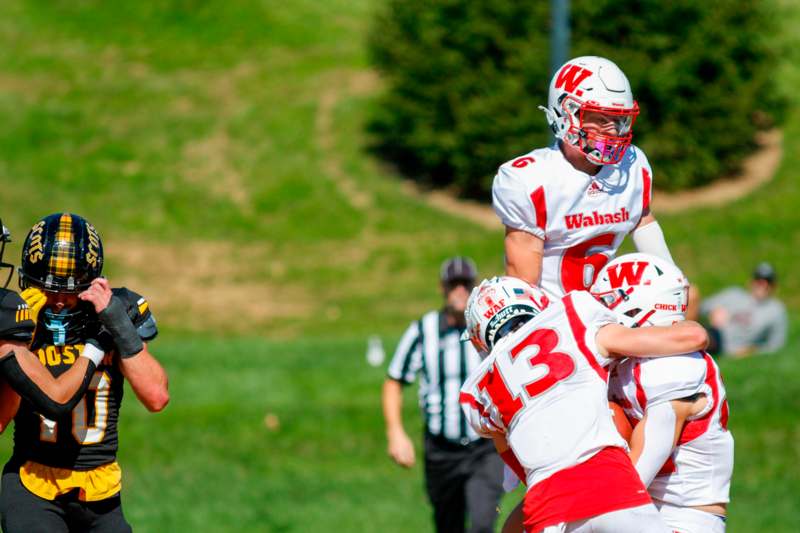 a football players in a huddle