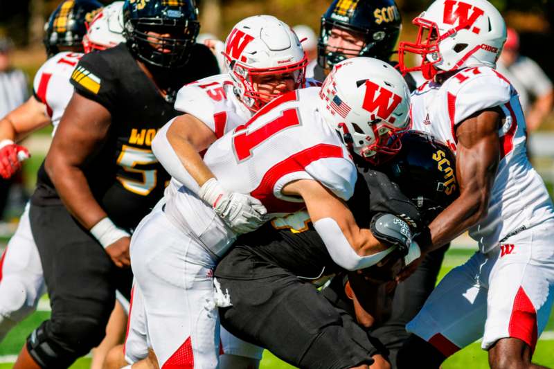 a group of football players in a game