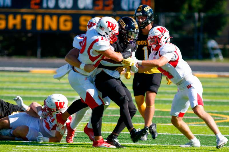 a group of football players on a field